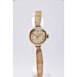 A LADIES 9CT GOLD 'TUDOR' WRISTWATCH, hand wound movement, round discoloured dial signed 'Tudor',