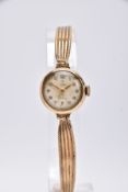 A LADIES 9CT GOLD 'TUDOR' WRISTWATCH, hand wound movement, round discoloured dial signed 'Tudor',