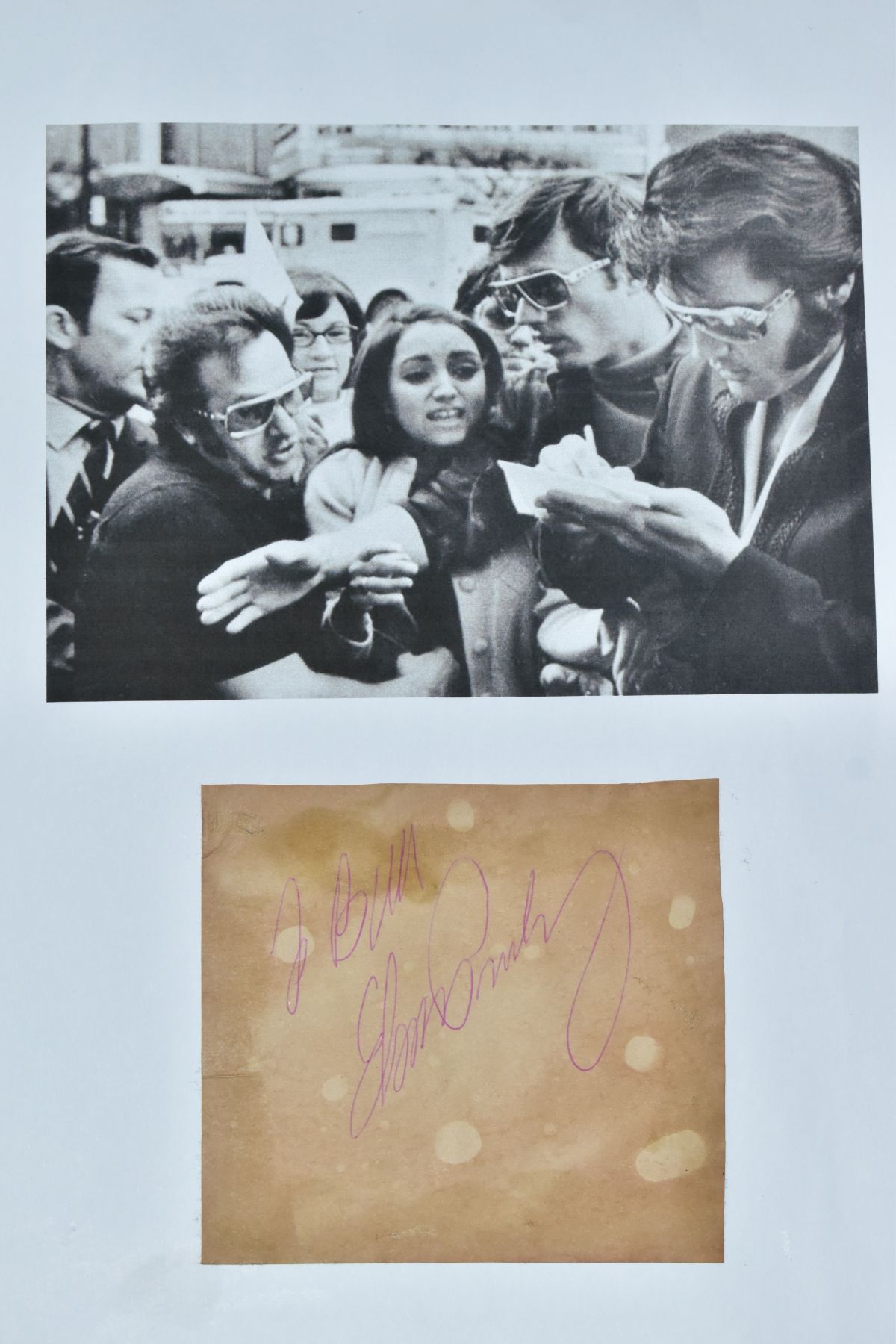 ELVIS PRESLEY AUTOGRAPH, an Elvis Presley Signature signed 'Best Wishes Elvis Presley' in red ink on