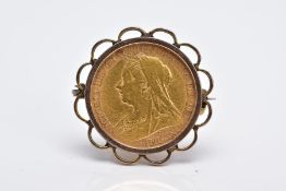 A MOUNTED VICTORIAN HALF SOVEREIGN BROOCH, depicting Queen Victoria, George and the Dragon, dated