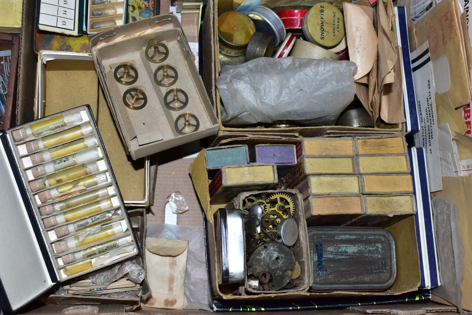 TWO BOXES OF ASSORTED WATCH MAKERS PARTS, GLASSES, COGS, SPRINGS, CROWNS, DECONSTTUCTED WATCH - Image 16 of 30