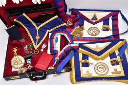 A CASE OF MASONIC REGALIA, a black case opens to reveal Masonic regalia such as two silver fob