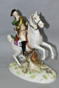 A LATE 19TH CENTURY CONTINENTAL PORCELAIN FIGURE OF A LATE 18TH CENTURY MAN WITH A HORN ON