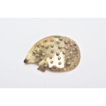 A 9CT GOLD BROOCH, in the form of a hedgehog with a ball detailed body and a round brilliant cut