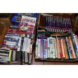 EPHEMERA, a collection of books, CD's, DVD's, VHS and football programmes in four boxes, the books