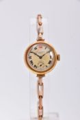 A LADIES 18CT GOLD WRISTWATCH, hand wound movement, round discoloured dial signed 'J.W. Benson',