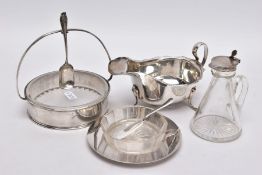 A SELECTION OF SILVER CONDITMENTS, to include a cut glass butter dish on a silver plain polished