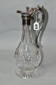 A LATE 20TH CENTURY CUT GLASS CLARET JUG WITH SILVER MOUNTS, the jug of baluster form, mounts