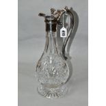 A LATE 20TH CENTURY CUT GLASS CLARET JUG WITH SILVER MOUNTS, the jug of baluster form, mounts