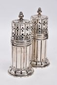 TWO GEORGE V SILVER SUGAR CASTERS, column form, wavy openwork base, pierced cover with a ball