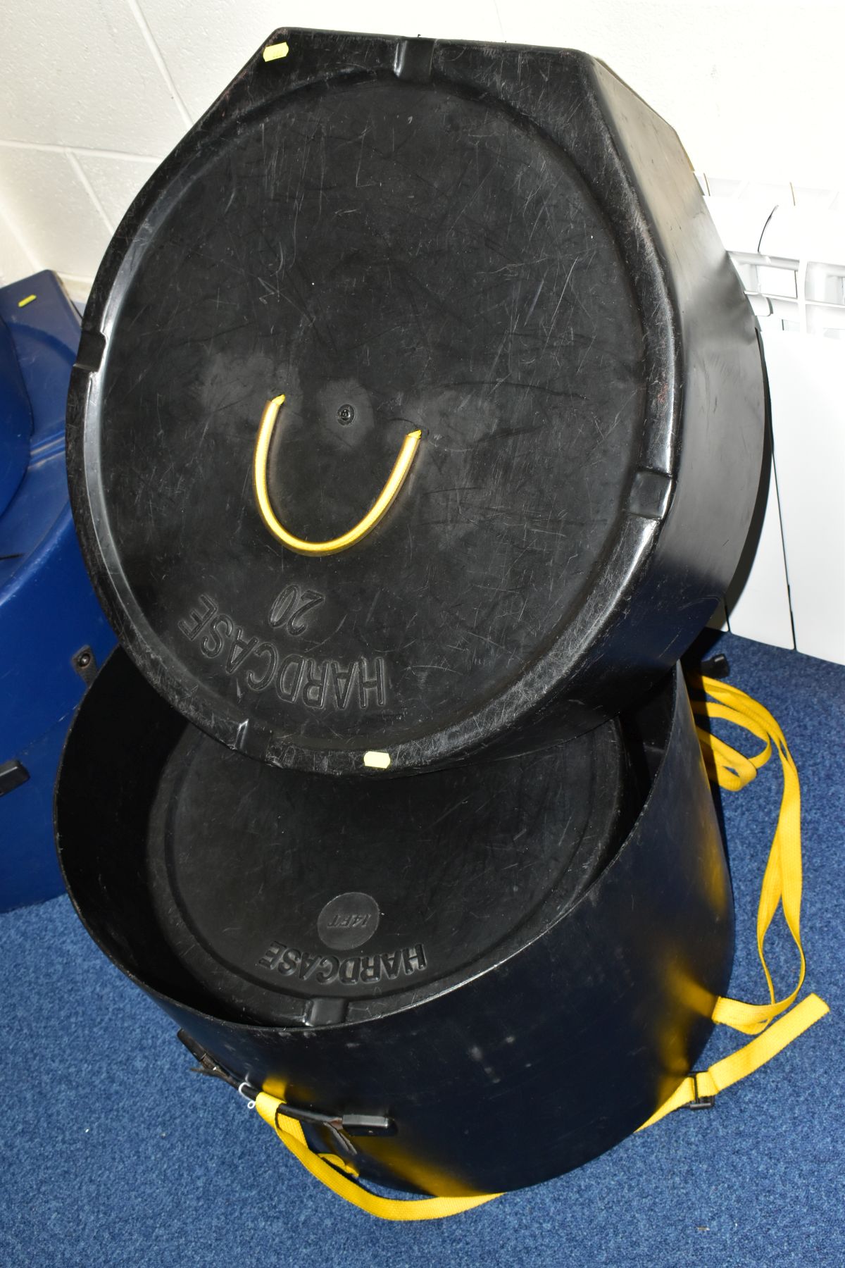 A SET OF THREE HARDCASE MOULDED PLASTIC DRUM CASES comprising 12'', 14'', and 20'' (3)