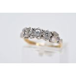 AN 18CT GOLD THREE STONE DIAMOND RING, designed with a row of illusion set round brilliant cut