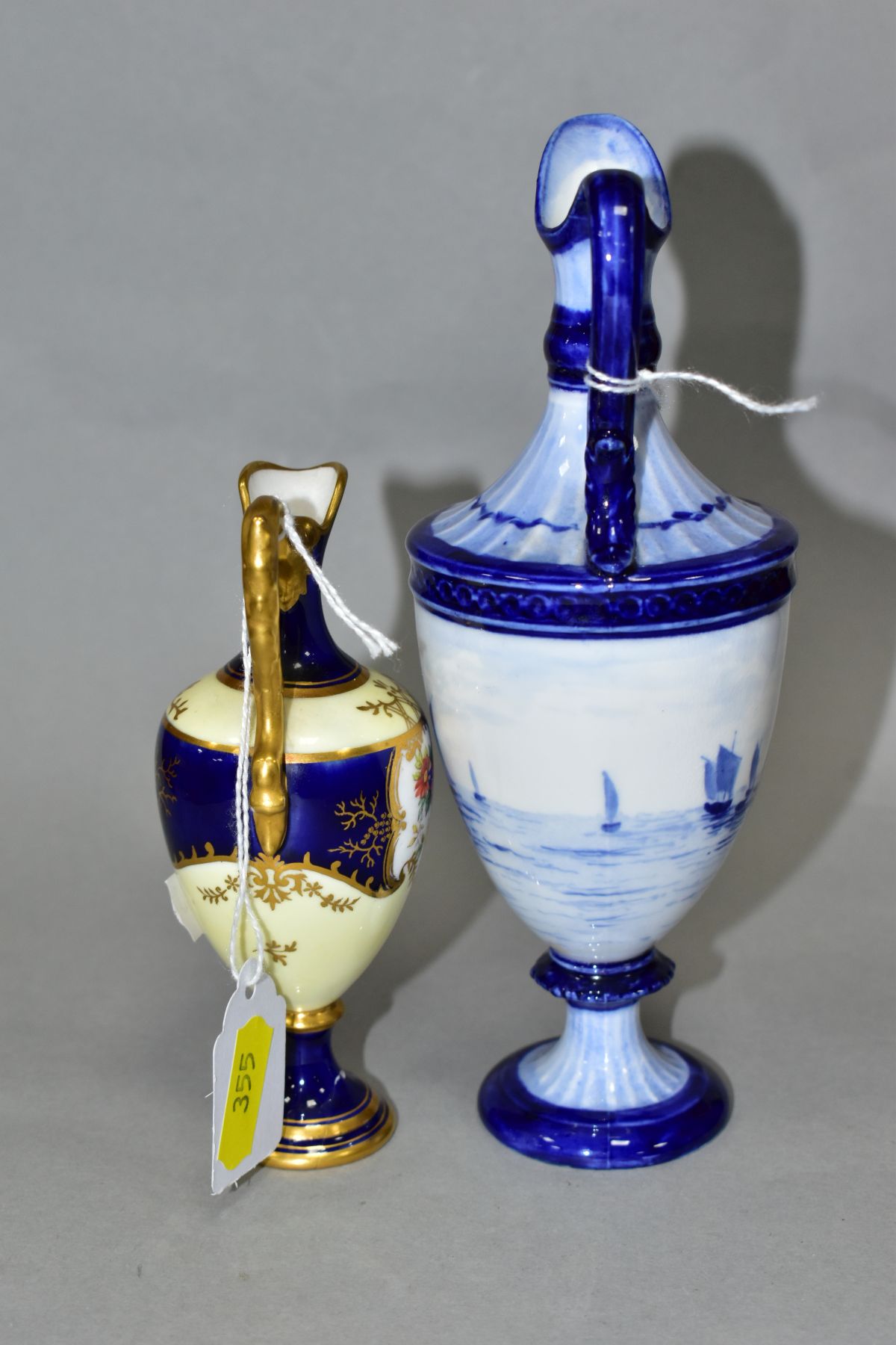 AN EARLY 20TH CENTURY COALPORT TOY EWER, blue and pale yellow ground with gilt detail and painted - Image 4 of 8