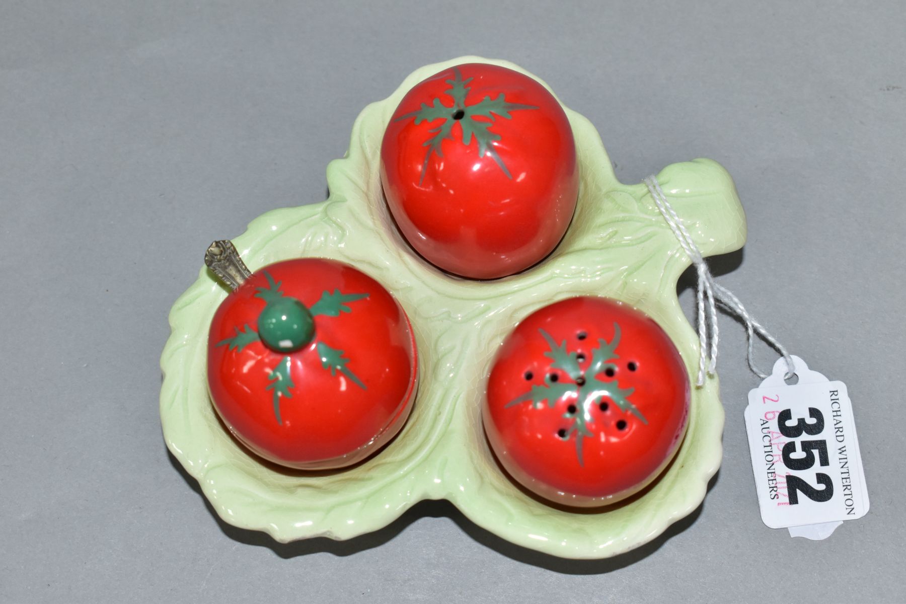 A CARLTON WARE AUSTRALIAN DESIGN CRUET IN THE FORM OF THREE TOMATOES ON A LEAF MOULDED STAND, salt - Image 2 of 6