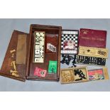 A WOODEN BOX CONTAINING A BOXED SET OF TSL BOXWOOD CHESSMEN, a boxed set of Crystalate dominoes,