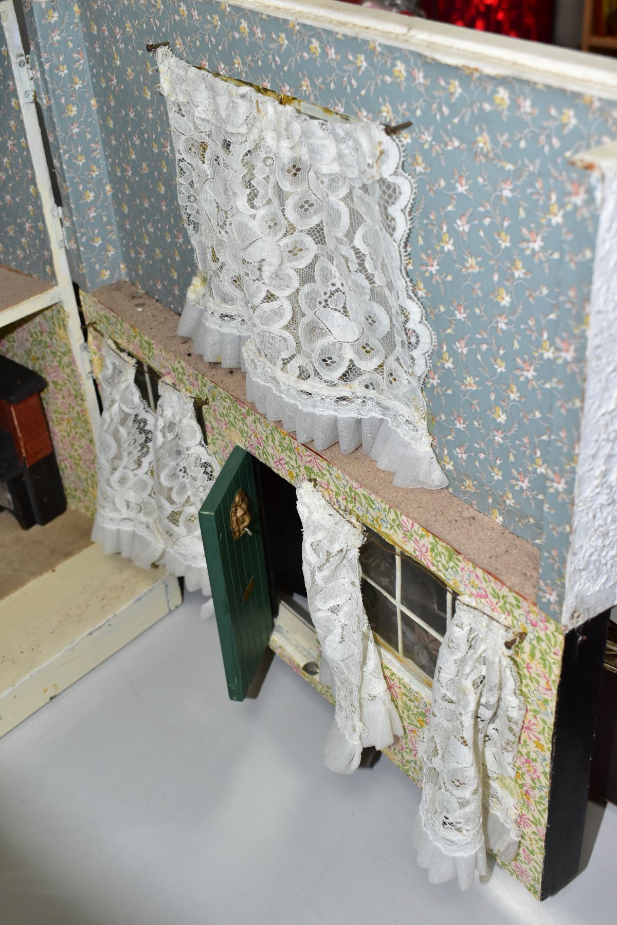 A WOODEN DOLLS HOUSE, modelled as a two storey town house, front opening to reveal two rooms, - Bild 8 aus 9