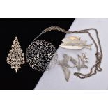 A SELECTION OF BROOCHES AND A PENDANT NECKLACE, to include a silver swans in flight brooch,