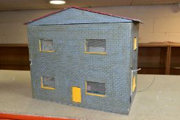 A SCRATCHBUILT WOODEN DOLLS HOUSE, modelled as a modern two storey detached house, removable