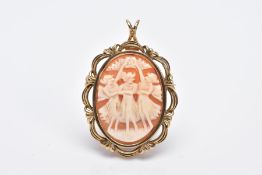 A 9CT GOLD CAMEO BROOCH/PENDANT, of an oval form depicting the three graces, within an openwork swag