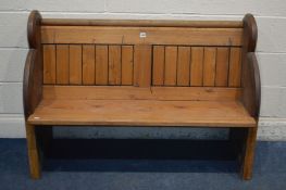 A PITCH PINE CHURCH PEW, length 126cm (losses)