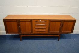 A G PLAN FRESCO 7FT SIDEBOARD, with two double cupboard doors flanking four drawers, the top