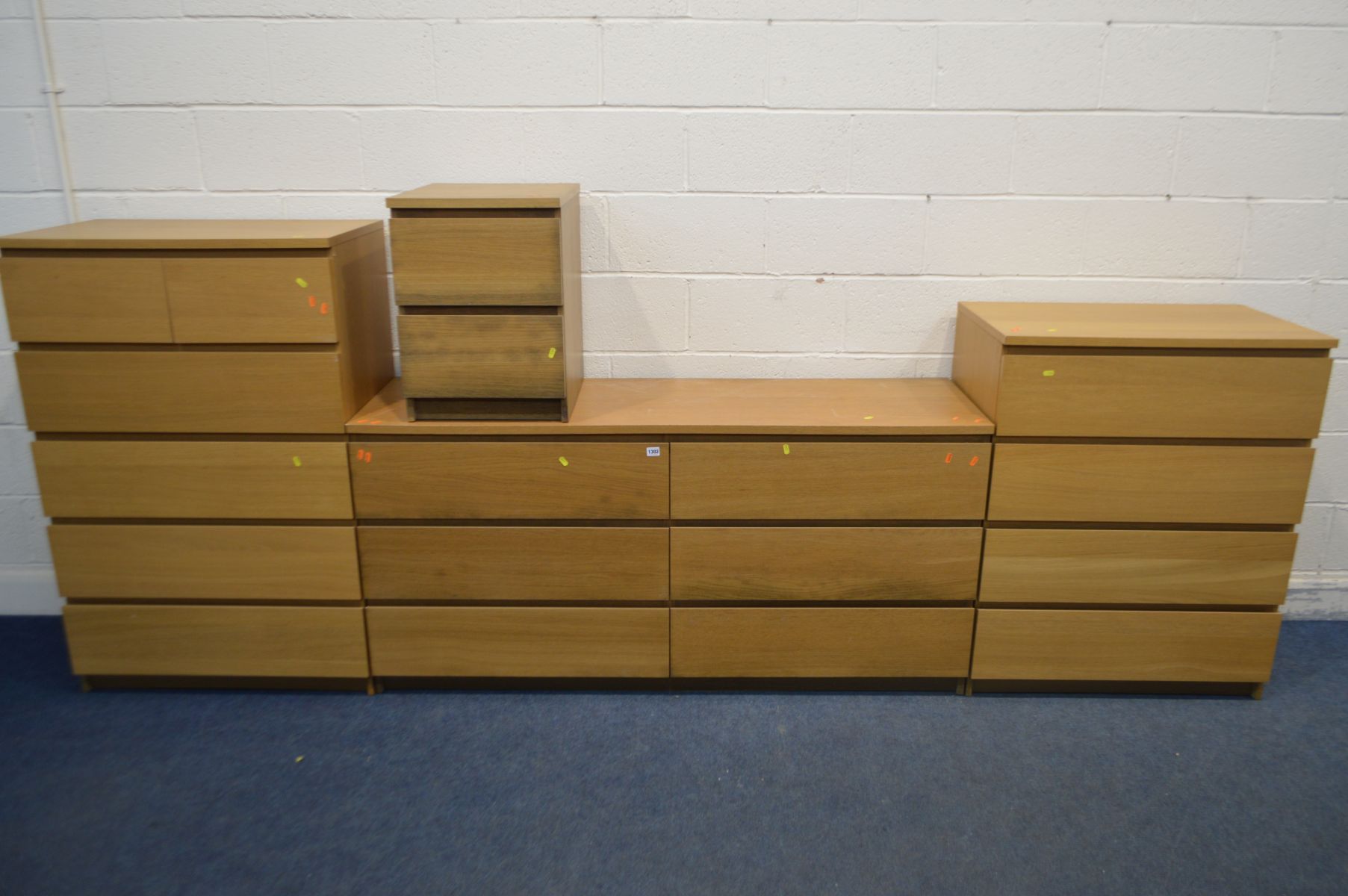 FOUR MATCHING STYLE LIGHT OAK FINISH CHEST OF DRAWERS, to include a sideboard/chest of six