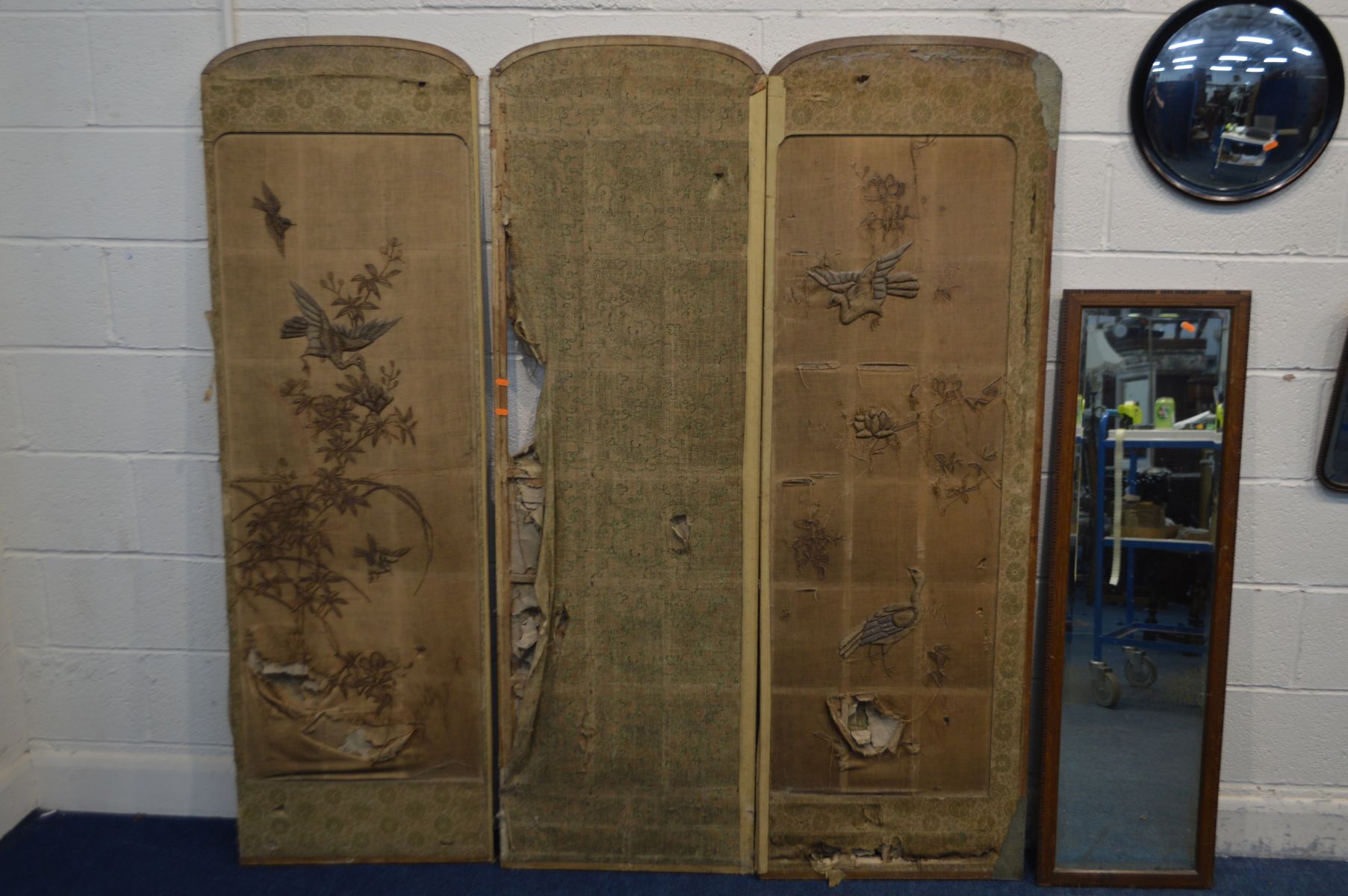 A DISTRESSED FABRIC THREE FOLD FLOORSTANDING SCREEN, along with an oak rectangular wall mirror, a - Image 2 of 4