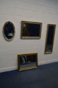 A COLLECTION OF WALL MIRRORS to include two matching styles of foliate gilt wood bevelled edged wall