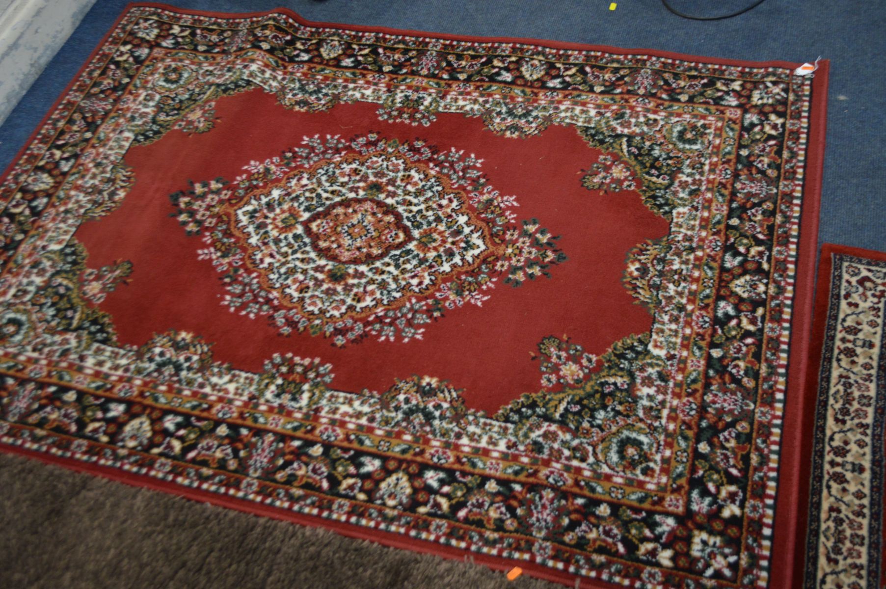 TWO MODERN RUGS, to include one stripped, largest size 170cm x 126cm and a red floral rug and a pair - Image 4 of 5