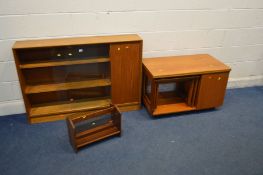 A MCINTOSH TEAK MULTI PURPOSE TABLE, with a fold over top, nest of tables and storage compartment, a