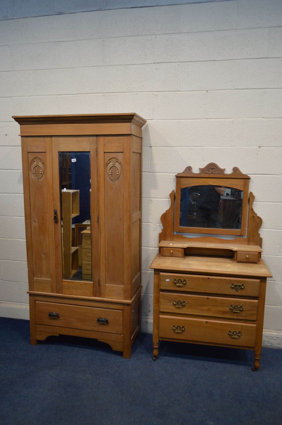 AN EDWARDIAN SATINWOOD TWO PIECE BEDROOM SUITE, comprising a single mirror door wardrobe above a