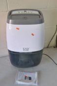 AN EASY HOME LE 2014 DEHUMIDIFIER with manual (PAT pass and working) (water tray has burn mark to