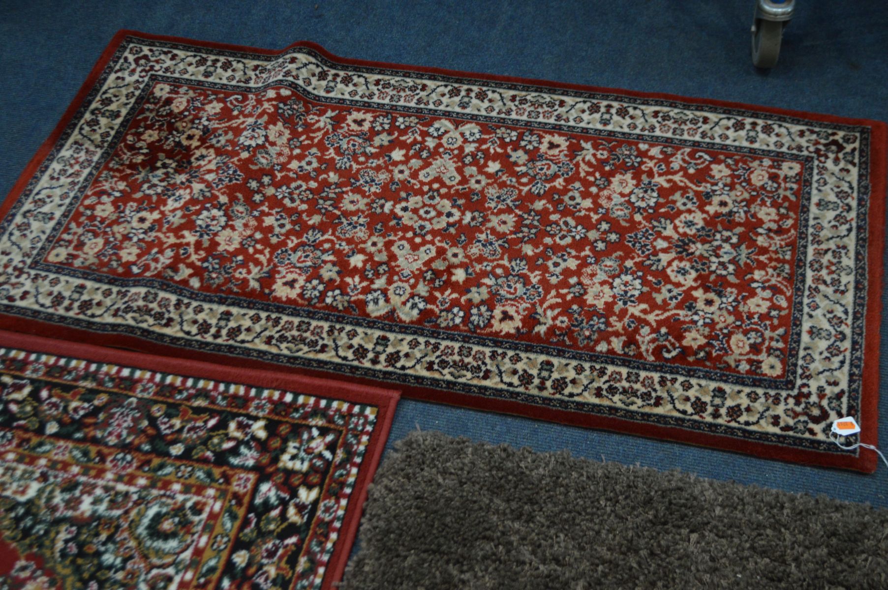 TWO MODERN RUGS, to include one stripped, largest size 170cm x 126cm and a red floral rug and a pair - Image 5 of 5