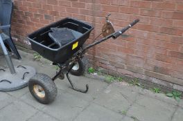 A LARGE GARDEN SEED SPREADER 80cm wide and 80cm high