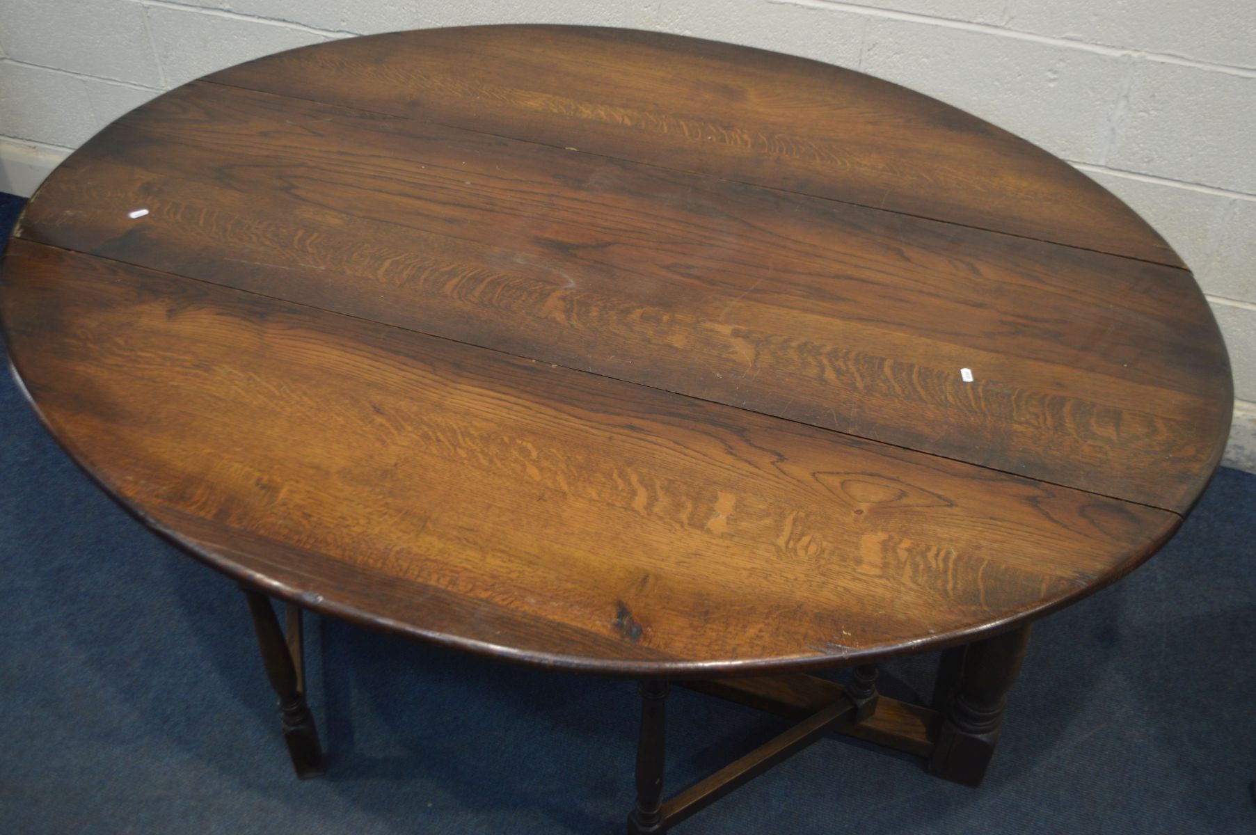 A 18TH CENTURY STYLE OAK WAKE TABLE, oval top with fall leaves, on turned and block legs, length - Image 3 of 5