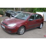 A 2003 FORD FOCUS LX TDCi HATCHBACK CAR in red, V5C present first Registered 31/03/2003 under Number