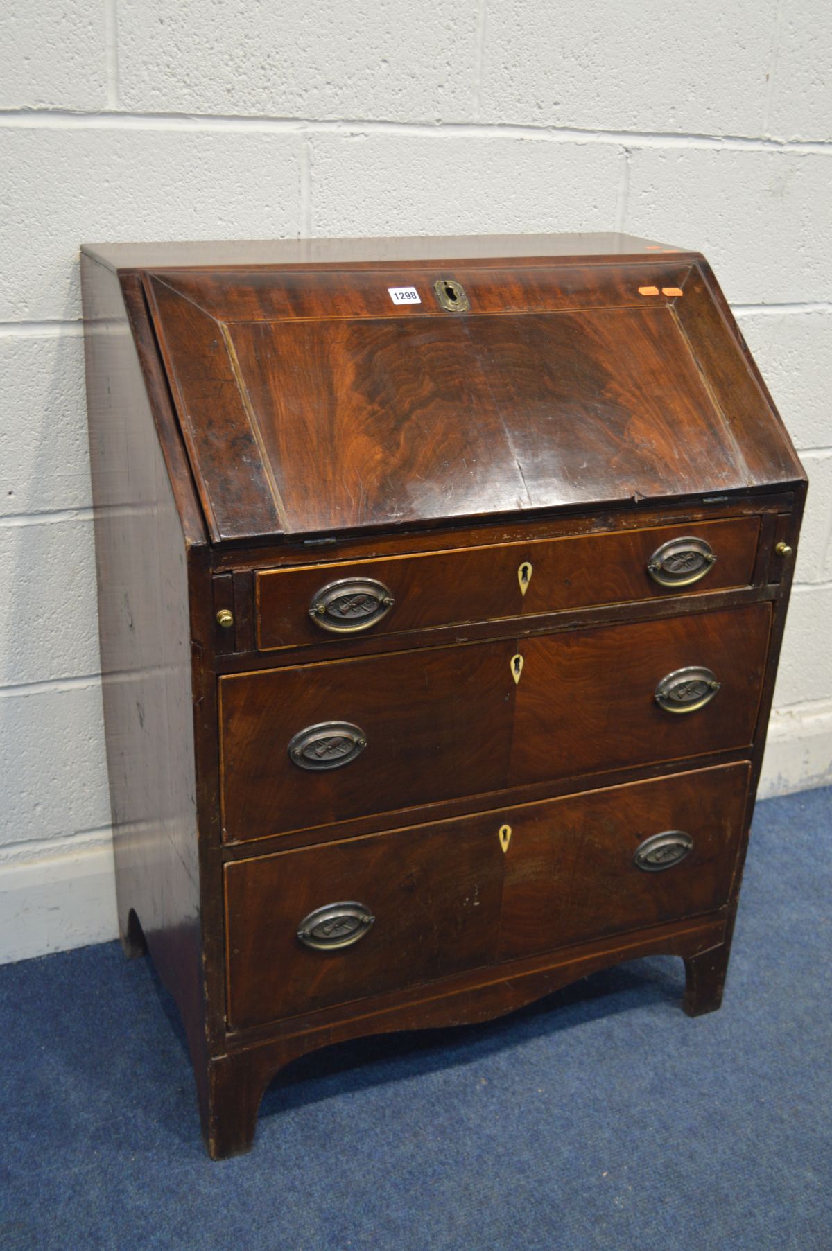 A MAHOGANY AND STRUNG INLAID BUREAU, constructed with old and newer timbers, with a fitted