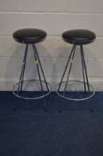 A PAIR OF BLACK FAUX LEATHER AND CHROME BAR STOOLS