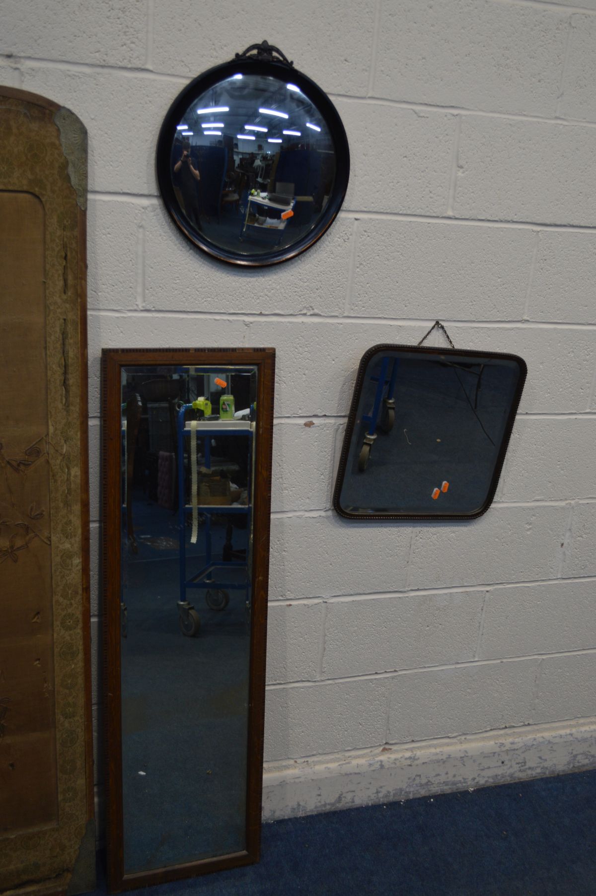 A DISTRESSED FABRIC THREE FOLD FLOORSTANDING SCREEN, along with an oak rectangular wall mirror, a - Image 3 of 4