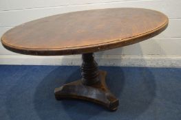 A CIRULAR PINE TOPPED BREAKFAST TABLE on a Victorian mahogany triform base, diameter 137cm x