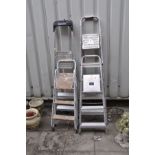 FOUR ALUMINIUM STEP LADDERS the largest being 167cm high