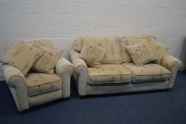 A CREAM AND FLORAL UPHOLSTERED TWO PIECE SUITE, comprising a two seater settee, length 204cm and a