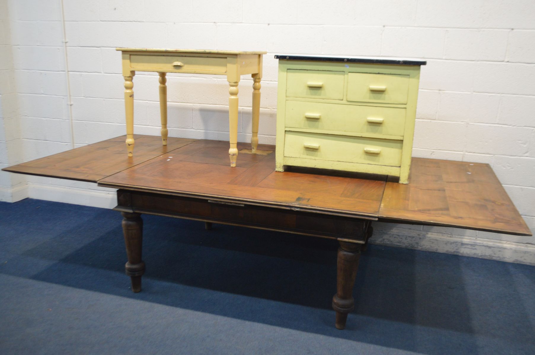 A LARGE FRENCH PARQUETRY TOPPED DRAW LEAF TABLE, on large turned legs, extended length 306cm x