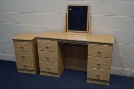 AN ALSTONS DRESSING TABLE with six drawers, separate swinging mirror, width 126cm x depth 40cm x