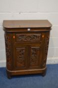 AN ORIENTAL HEAVILY CARVED CAMPHOR WOOD COCKTAIL CABINET, width 74cm x depth 40cm x height 96cm