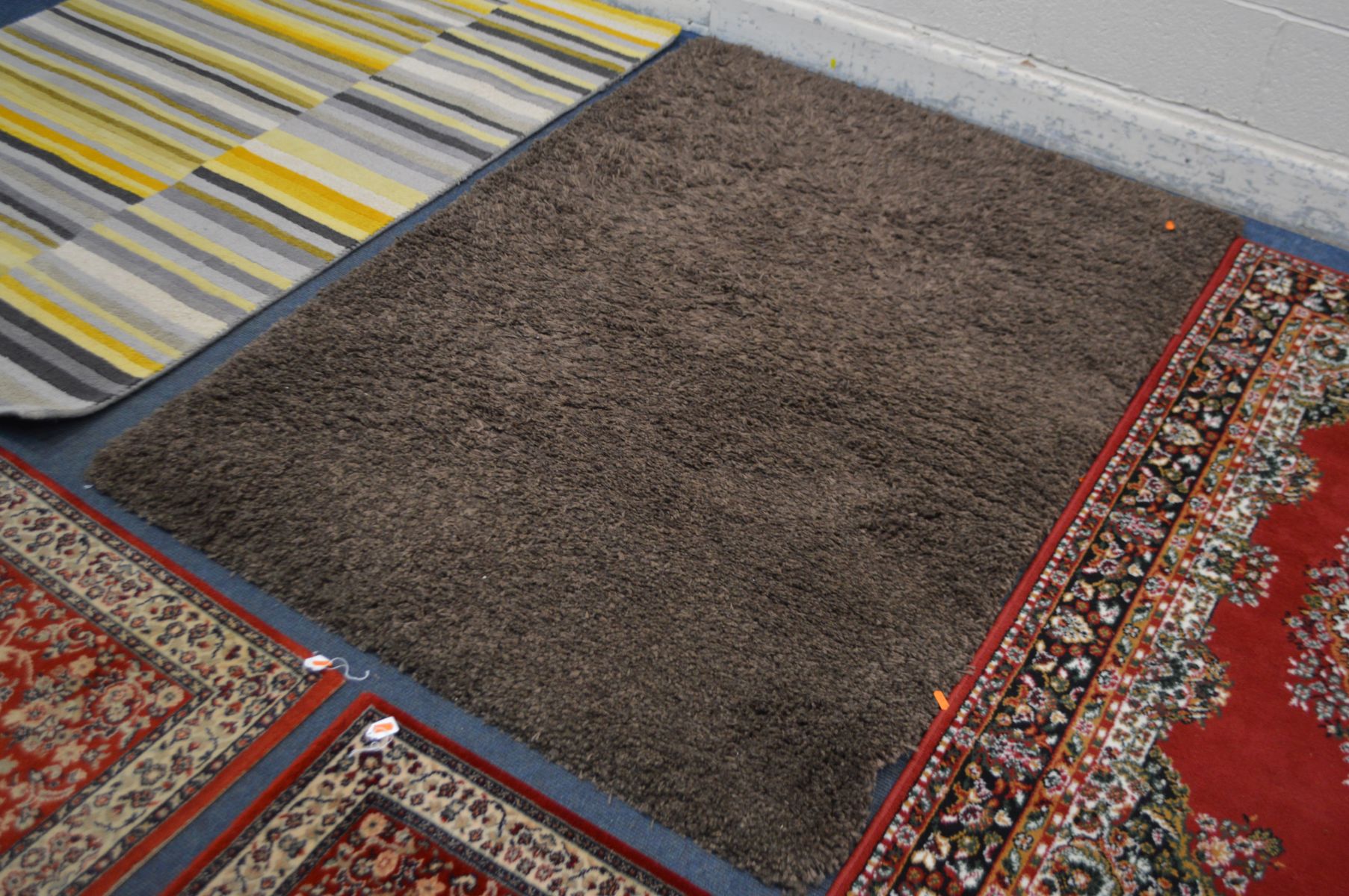 TWO MODERN RUGS, to include one stripped, largest size 170cm x 126cm and a red floral rug and a pair - Image 2 of 5