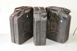 THREE VINTAGE METAL 'JERRY' CANS 20L capacity and five vintage plastic water containers, Est 20L