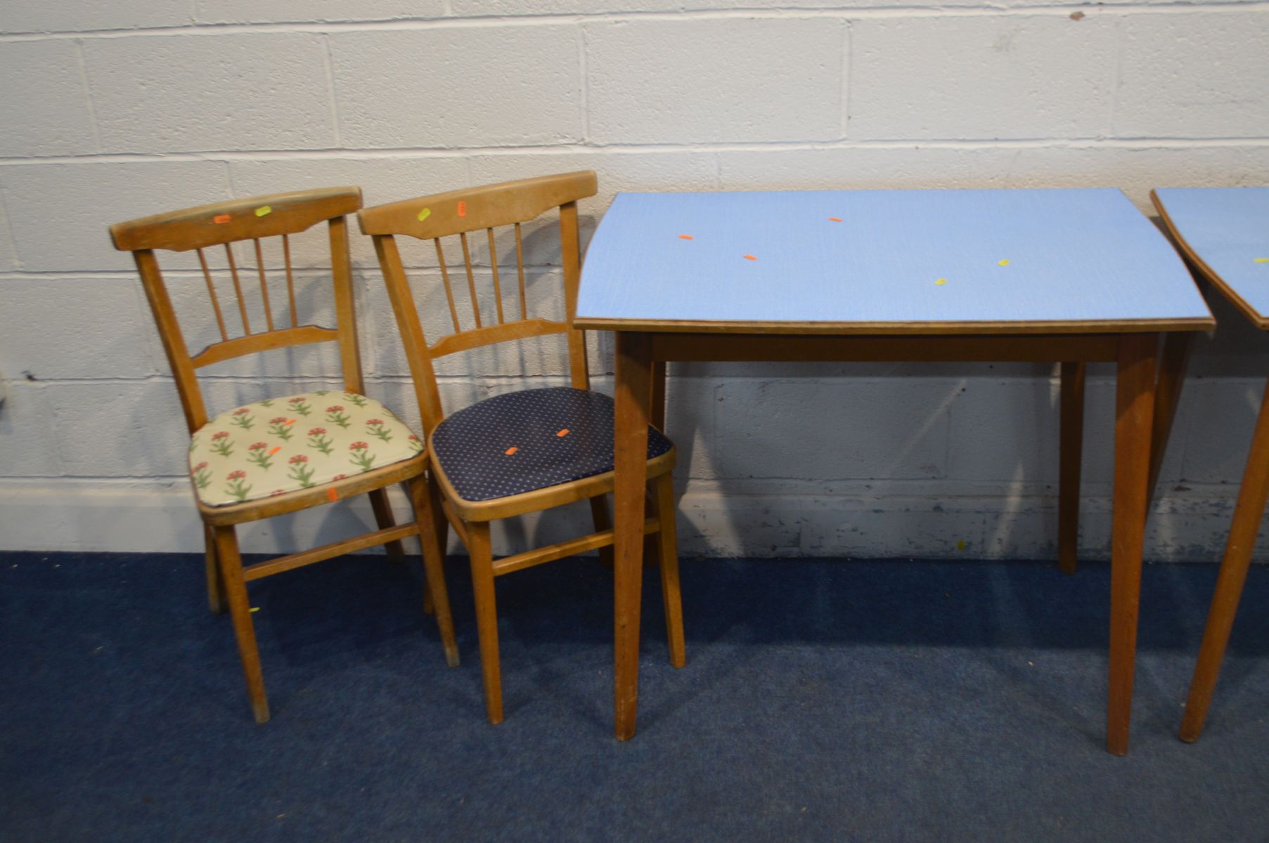 A PAIR OF MATCHING FORMICA TOPPED KITCHEN TABLES, width 92cm x depth 61cm x height 77cm and four