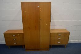 A PAIR OF MID 20TH LIGHT OAK CHEST OF THREE LONG DRAWERS, width 75.5cm x depth 40cm x height 70cm