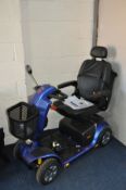 A PRIDE MOBILITY COLT DELUXE 2.0 MOBILITY SCOOTER in nearly new condition with Power supply and